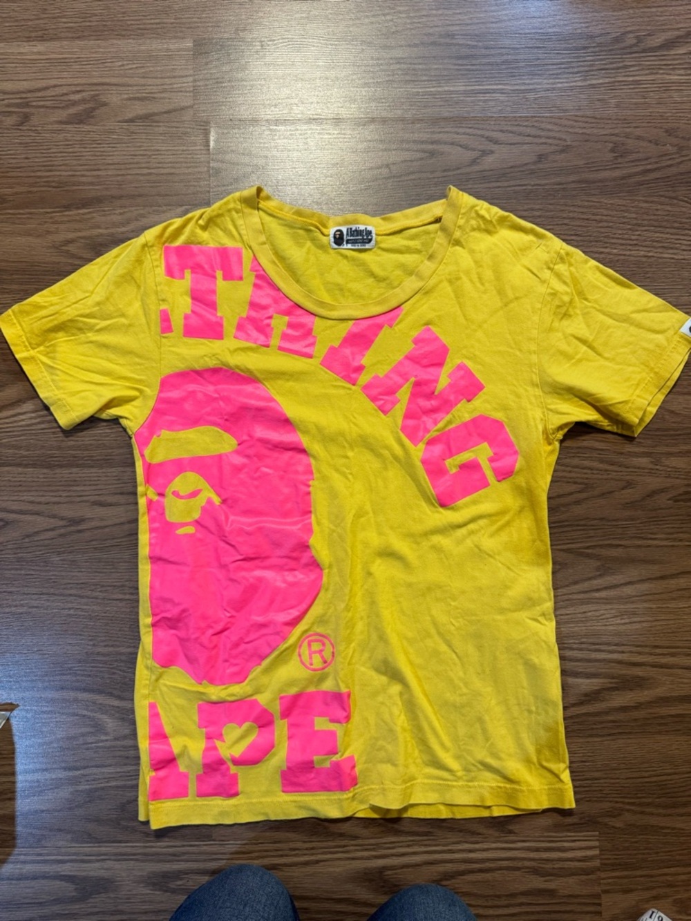 A Bathing Ape Yellow Tee with Pink Graphic